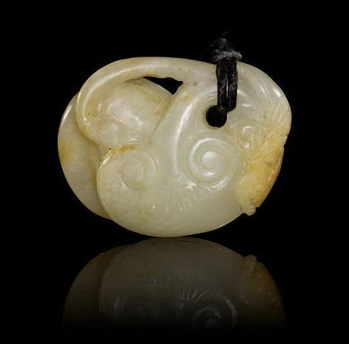 * A Carved Jade Pendant Length 2 inches.