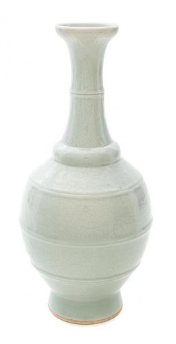 * A Monochrome Glazed Bottle Vase Height 10 inches.