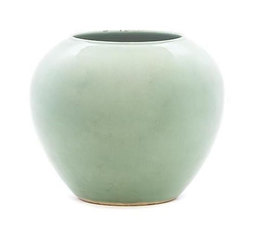 A Celadon Glazed Porcelain Jar Height 11 3/4 inches.