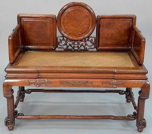 Chinese hardwood bench having burlwood panels and woven seat with custom cushion. 
height 36 inches, width 41 inches, depth 22 inches