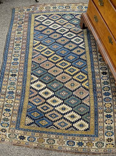 Caucasian Oriental throw rug (end borders missing). 
4'5" x 7'