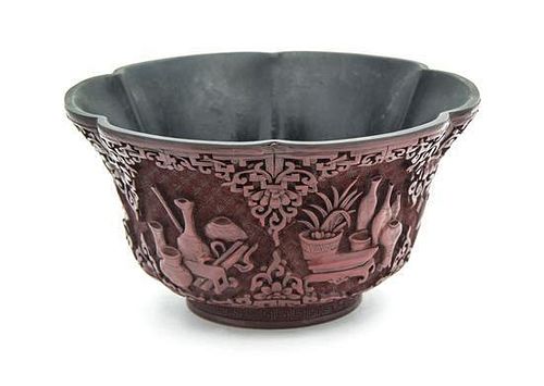 A Carved Cinnabar Lacquer Footed Bowl Height 4 inches.