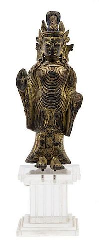 A Gilt Bronze Figure of Guanyin Height 6 inches (without stand).