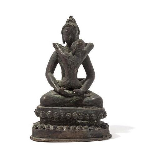 A Bronze Figure of Buddha Height 7 1/2 inches.