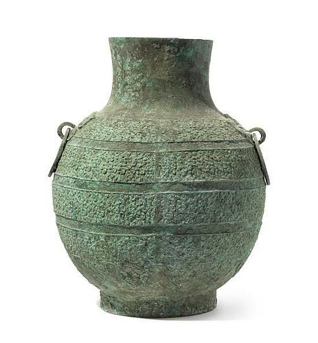 An Archaistic Bronze Wine Jar, Hu Height 15 3/4 inches.