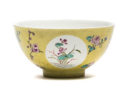 A Famille Jaune Bowl Height 2 3/8 x diameter 4 5/8 inches.