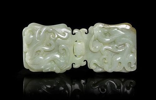 A Carved Jade Belt Buckle Width overall 4 3/4 inches.