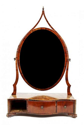 A George III Mahogany Shaving Mirror, Height 29 1/2 x width 17 3/4 x depth 9 inches.