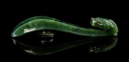 * A Spinach Green Jade Belt Hook Width 4 1/4 inches.