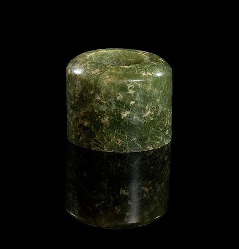 * A Spinach Jade Archer's Ring Diameter 1 1/2 inches.