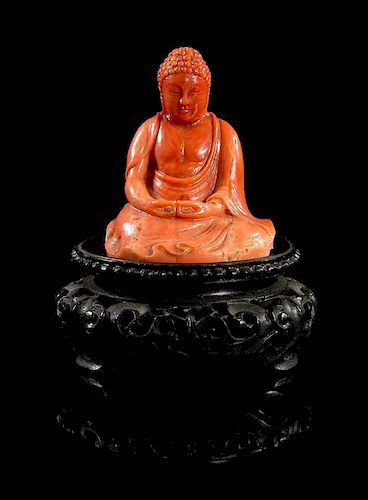 A Red Coral Figure of Seated Buddha Height 2 1/2 inches (without stand).