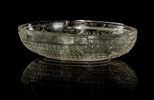 * A Carved Rock Crystal Coupe Width 3 7/8 inches.