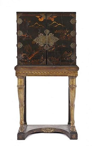 A Chinese Export Cabinet on Stand, Height 63 x width 31 1/2 x depth 17 3/4 inches.