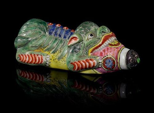 * A Polychrome Porcelain Snuff Bottle Width 3 3/8 inches.