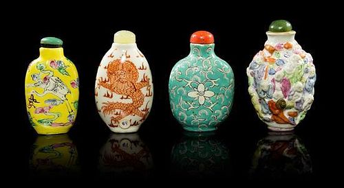 * A Group of Four Porcelain Snuff Bottles Height of tallest 3 3/8 inches.