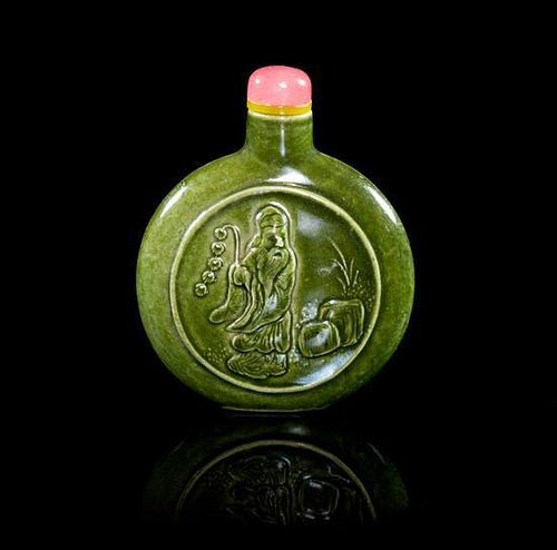 A Green Glaze Porcelain Snuff Bottle Height 2 3/8 inches.