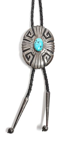 Tommy Singer (Dine, 1940-2014) Silver and Turquoise Bolo Height 2 5/8 x width 1 7/8 inches