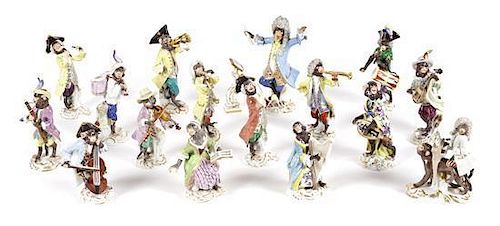 A Meissen Porcelain Seventeen-Piece Monkey Band, Height of tallest 6 5/8 inches.