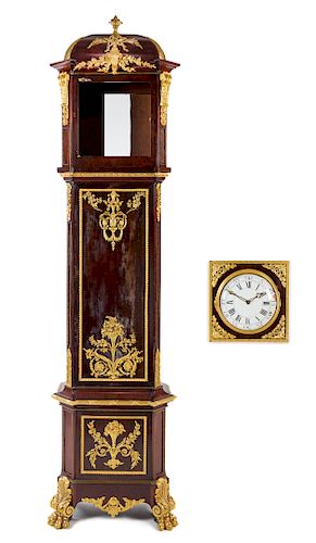 A Louis XVI Style Gilt Bronze Mounted Mahogany Tall Case Clock Height 105 x width 24 1/2 x depth 11 1/2 inches.