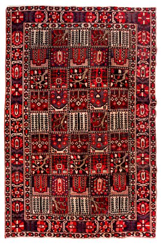 A Bakhtiari Wool Rug 10 feet x 6 feet 9 inches.