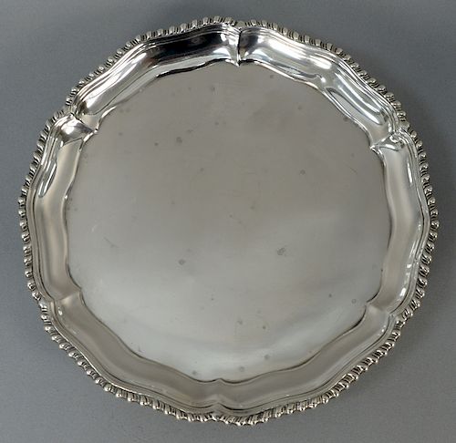 Rare American silver salver Myer Myers New York (1723-1795), having a shaped form topped by a gadroon edge, set on three legs ending...