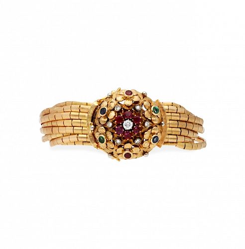Gold and precious stones bracelet, circa 1960 Pulsera en oro y pedrería, hacia 1960