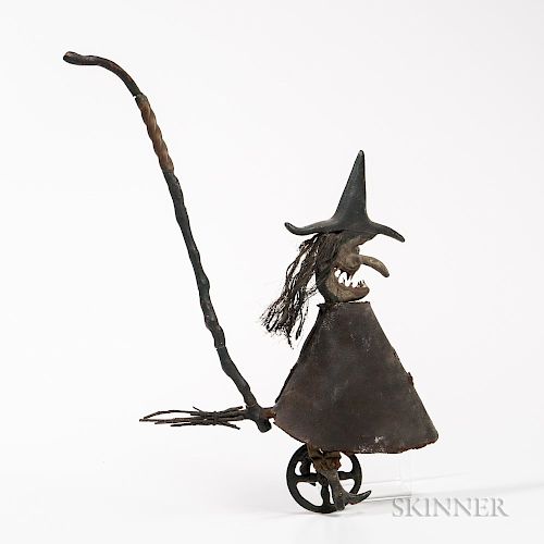 Carved Witch on a Bicycle Push Toy