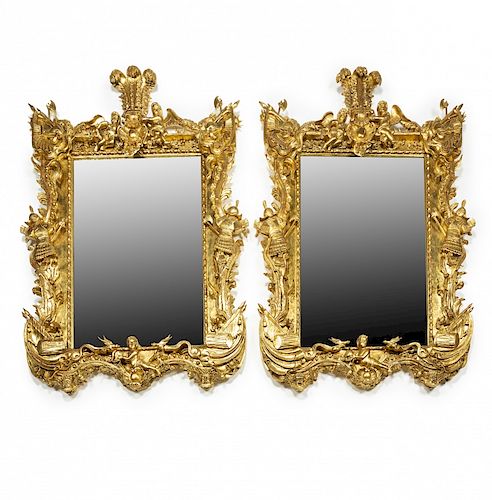 Pair of large historicist mirrors with frames in carved and Pareja de grandes espejos historicistas con marcos en mader