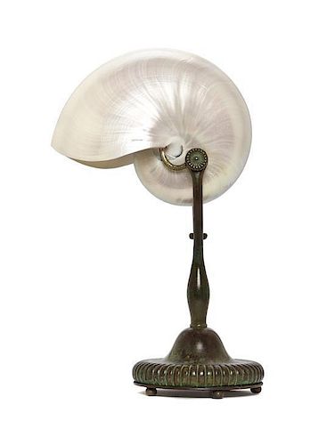 A Tiffany Studios Bronze and Nautilus Shell Lamp, Height 12 1/2 inches.