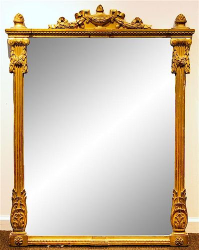 A Neoclassical Giltwood Mirror Height 43 inches.