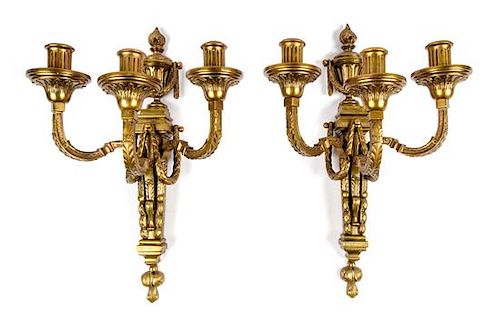 A Pair of Louis XVI Style Gilt Bronze Three-Light Sconces Height 22 3/4 inches.