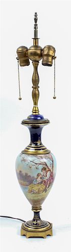 * A Sevres Style Porcelain Urn Height overall 27 inches.