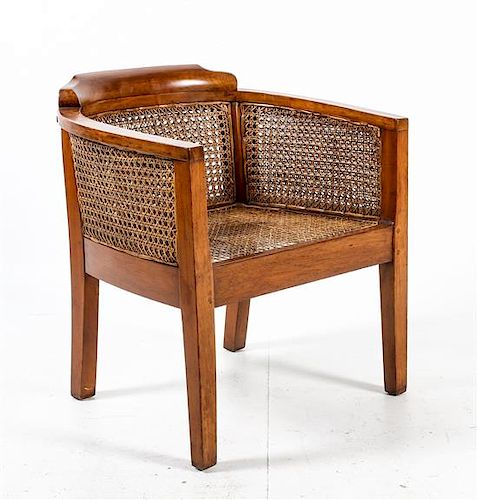 * A British Colonial Style Arm Chair Height 26 inches.