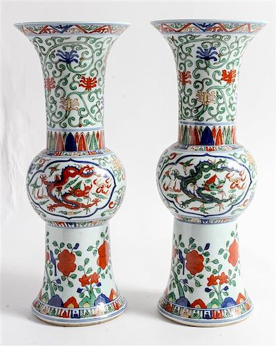 * A Pair of Wucai Porcelain Beaker Vases Height 15 1/2 inches.