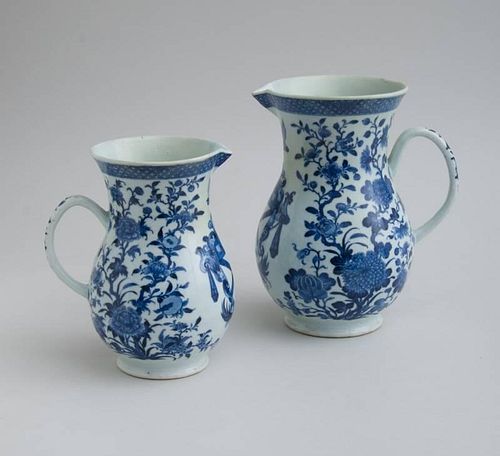 PAIR OF CHINESE EXPORT BLUE AND WHITE PORCELAIN ARMORIAL GRADUATED PITCHERS