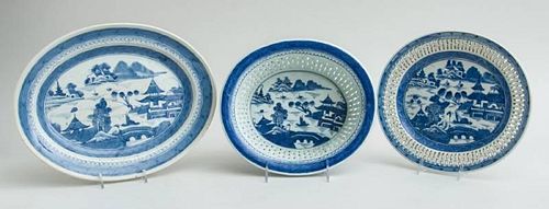 CANTON BLUE AND WHITE PORCELAIN WILLOW PATTERN RETICULATED OVAL BASKET AND STAND AND AN OVAL PLATTER