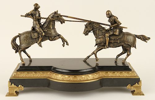 BRONZE FIGURAL GROUP OF JOUSTING KNGHTS ONYX BASE