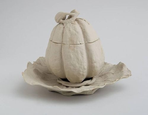 CONTINENTAL UNGLAZED POTTERY PUMPKIN-FORM SAUCE TUREEN AND ATTACHED STAND