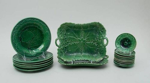 GROUP OF EIGHTEEN ENGLISH GREEN-GLAZED LEAF-MODELED TABLE ARTICLES