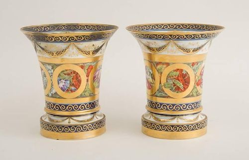 PAIR OF CONTINENTAL PORCELAIN BEAKER-FORM JARDINIÈRES AND STANDS