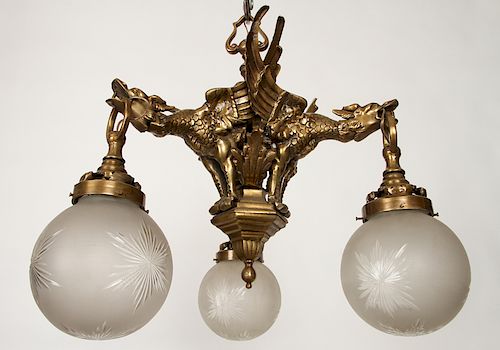 EARLY 20TH C. BRASS CHANDELIER GRIFFIN FORM