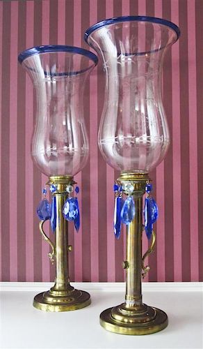 A Pair of Russian Brass Candlesticks, Height 20 inches.