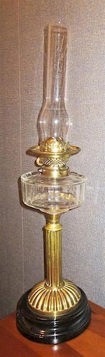 A Victorian Brass Hurricane Oil Lamp, Height 27 inches.