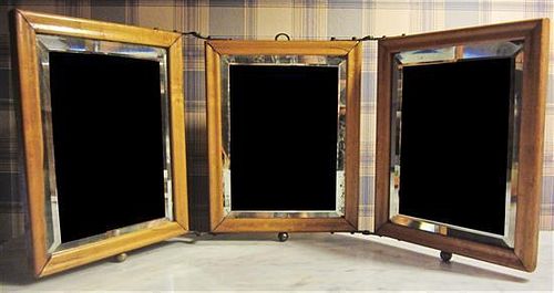 A Maple-Framed Triptych Mirror, Height 9 1/2 x width 22 1/2 inches.
