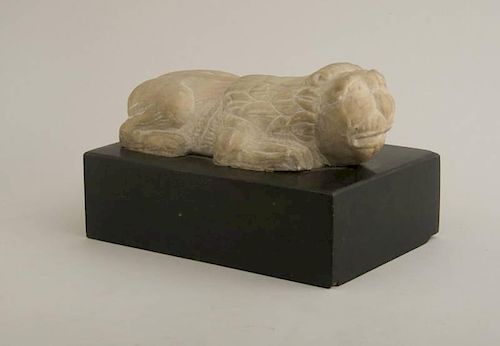 MEDIEVAL CARVED MARBLE FIGURE OF A CROUCHING LION