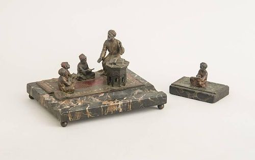 AUSTRIAN COLD-PAINTED BRONZE NORTH AFRICAN GROUP, FITTED ONTO A VEINED MARBLE PEN TRAY; AND A PAPERWEIGHT