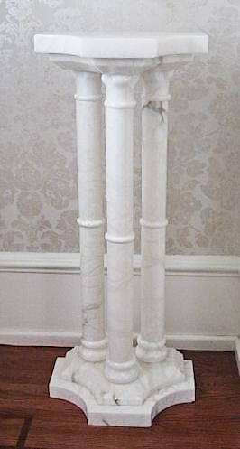 A Pair of Marble Pedestals, Height 38 x width 15 3/4 x depth 10 1/2 inches.