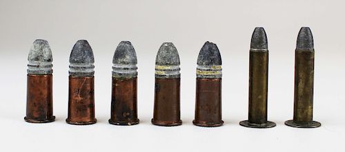 seven Spencer & Maynard metallic cartridges
