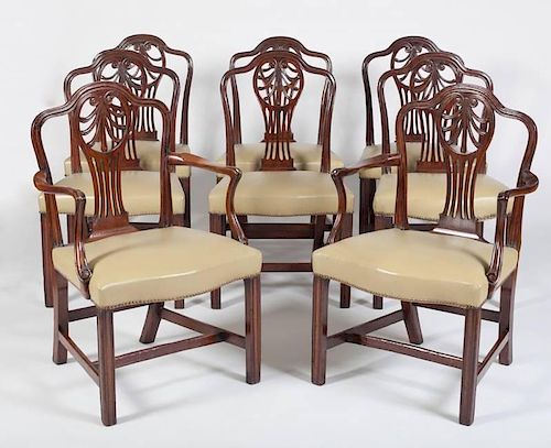 SET OF TEN GEORGE III CARVED MAHOGANY DINING CHAIRS, INSPIRED BY THE DESIGNS OF GEORGE HEPPLEWHITE