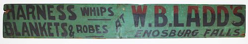 W.B.Ladd's wooden trade sign